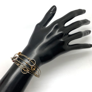 Circular Gold and Silver Steel Cable Bracelet-Bracelets-Bernd Schmid-Pistachios